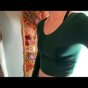 Long sleeve green top.